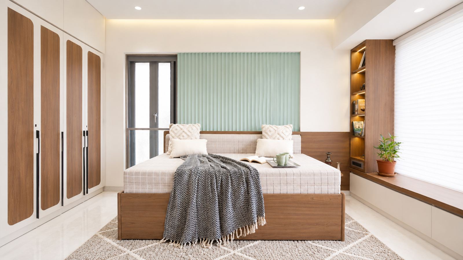Bedroom with mint green panel and wood wardrobes, Mumbai