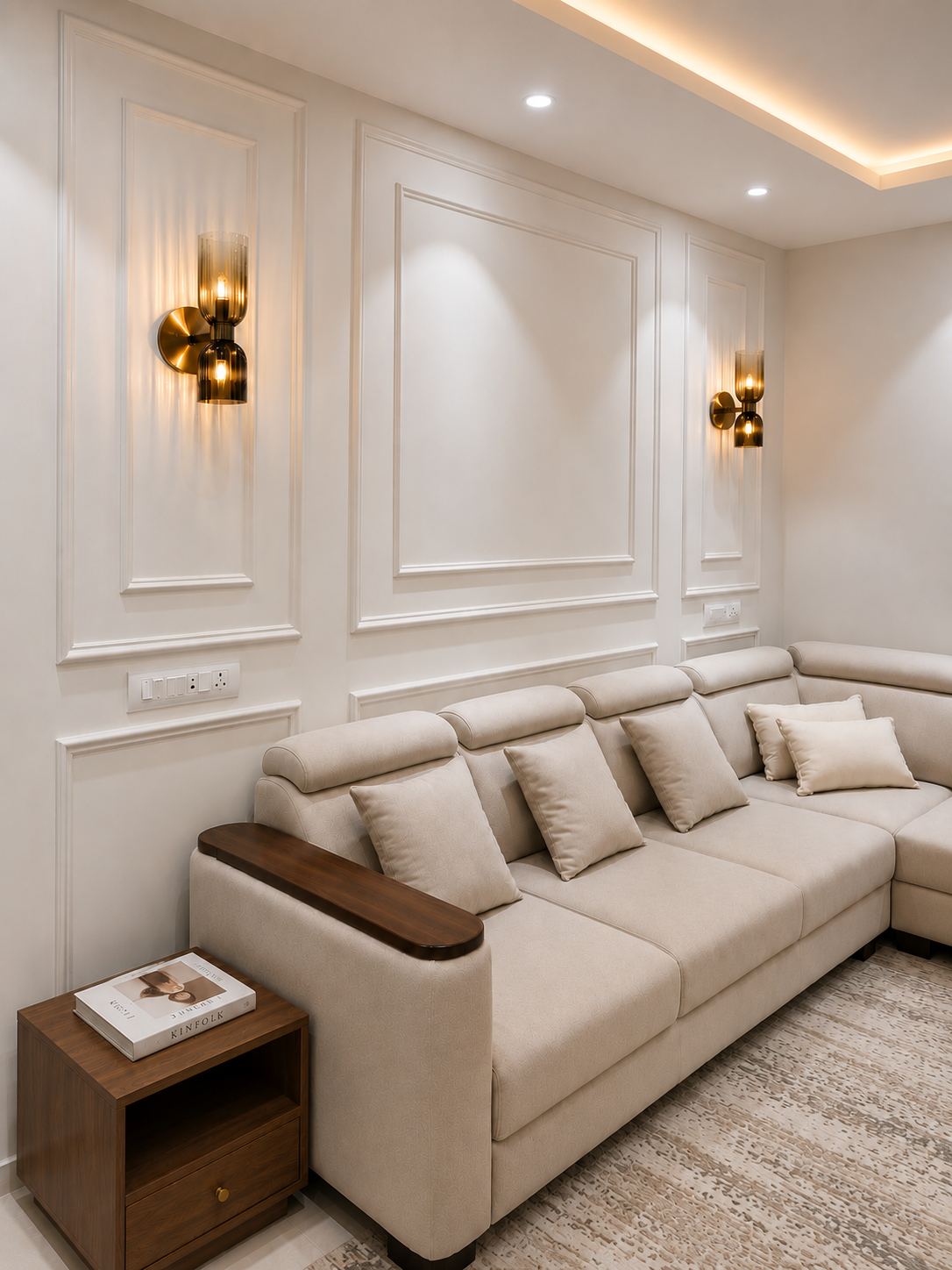 Living room wall panelling with gold sconces, luxury interiors Mumbai