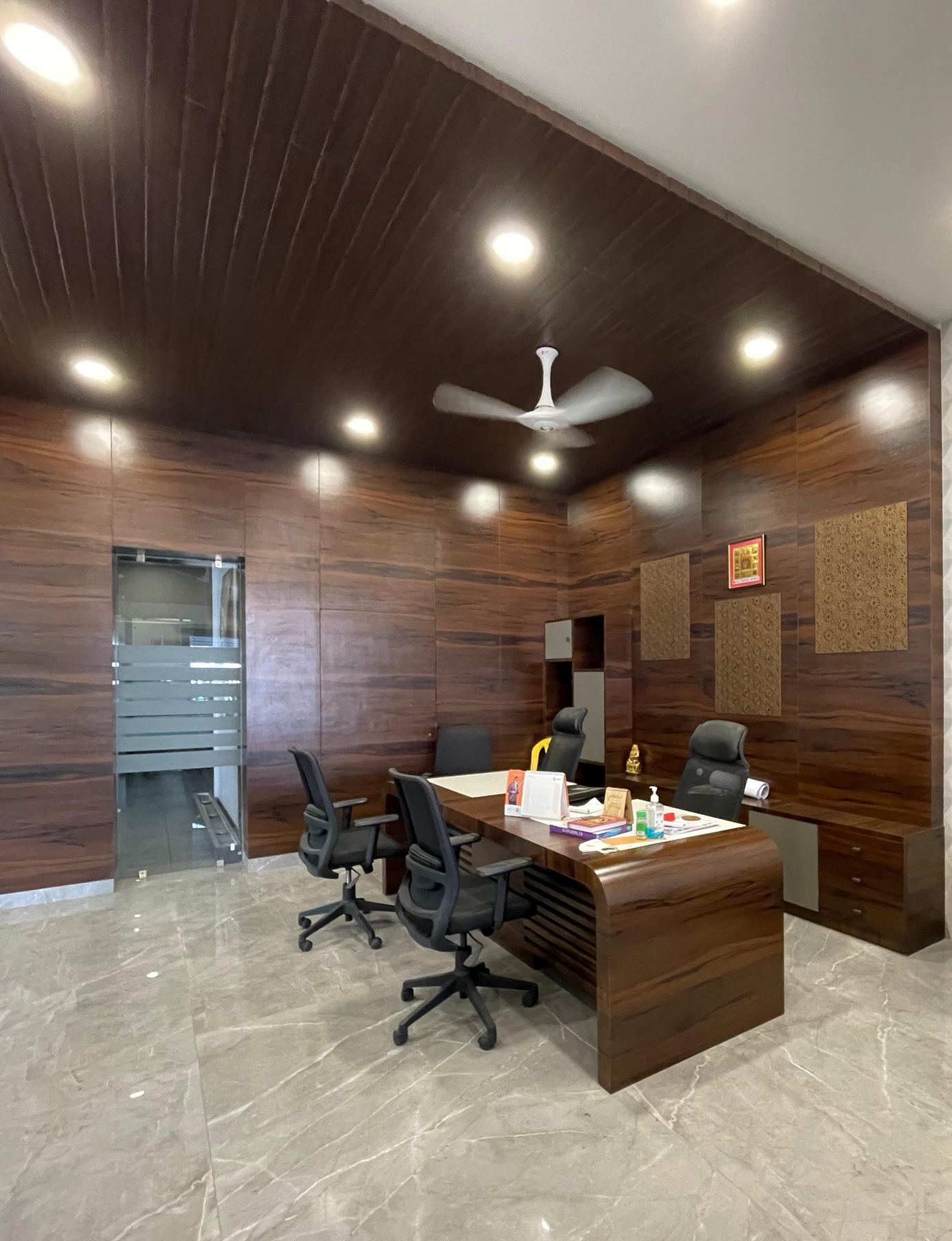 Office cabin with wood panelling, commercial interior design Mumbai