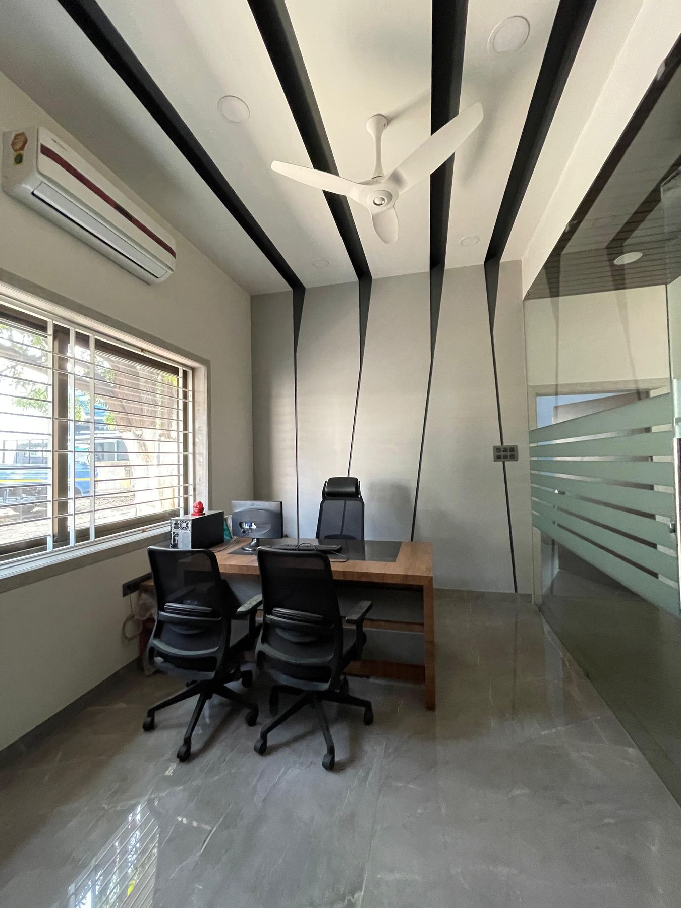Team workspace with fluted panels, office interior design Mumbai